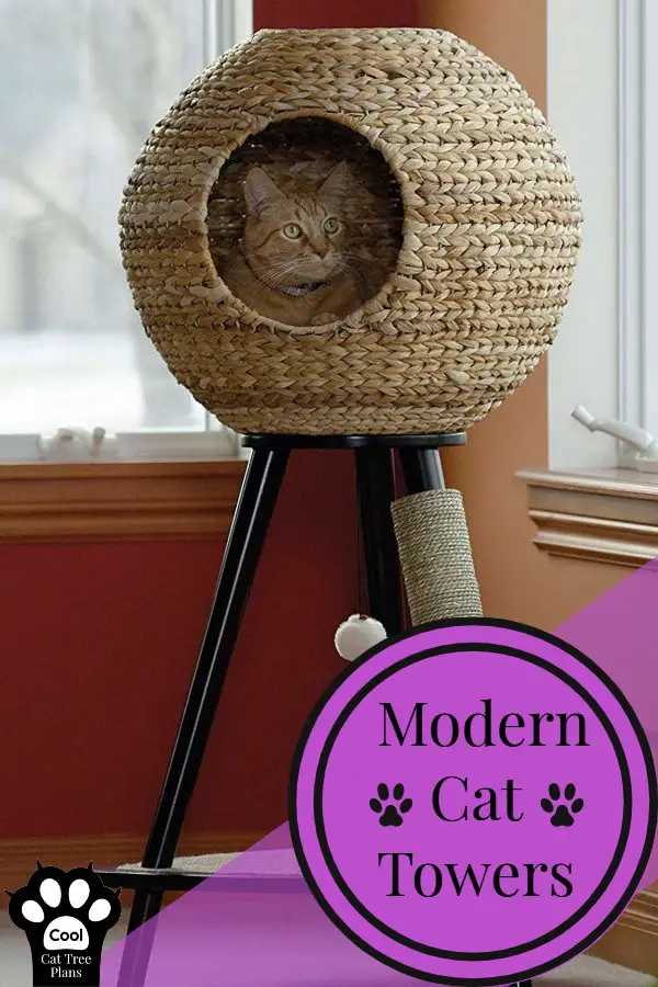 A cat lounging in a modern cat tower that has a wicker orb bed on the top