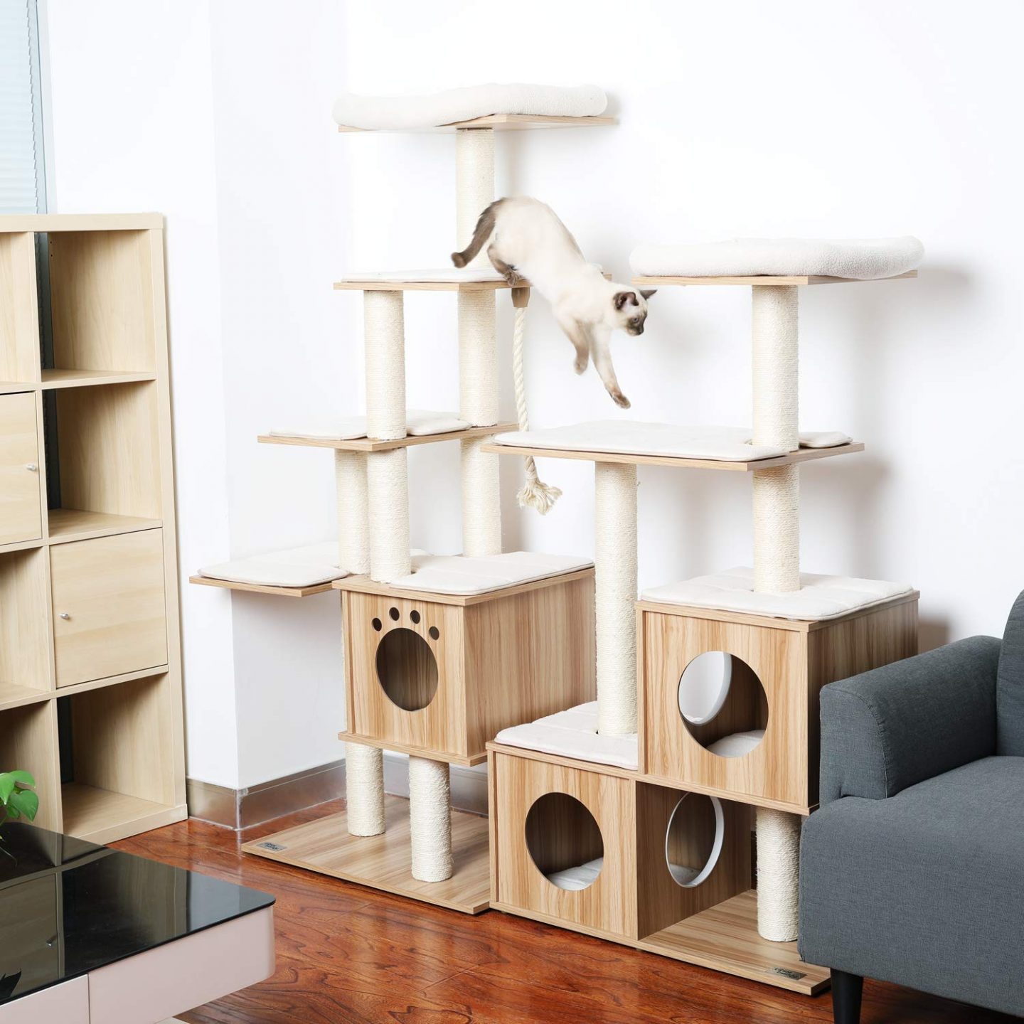 If you like a cat tree you already have, but want something bigger that still fits in with your decor and the other cat furniture you already have, you can try getting another of the same or similar cat trees and snugging them up together to make a big cat play gym.