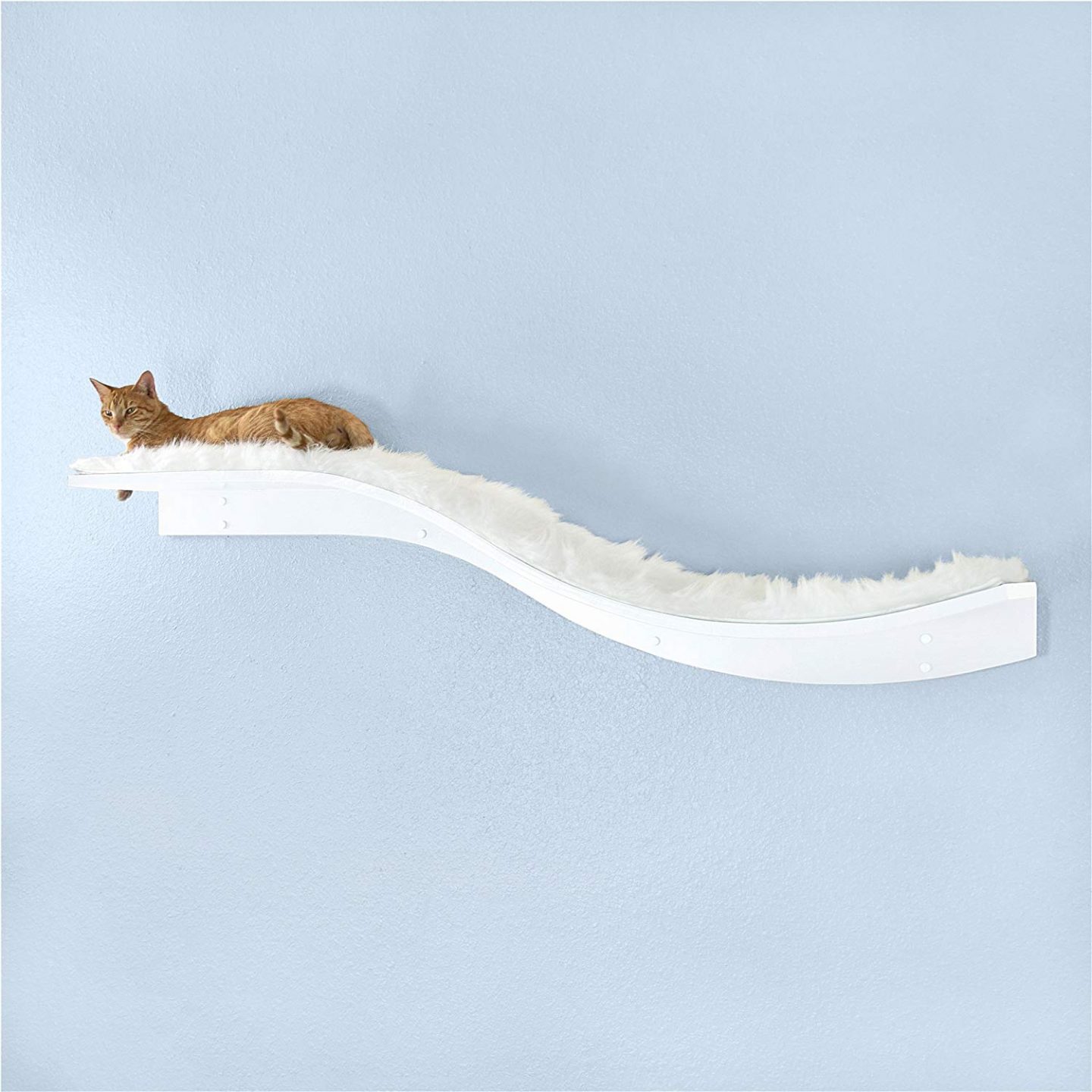 This white cat shelf with faux fur works perfectly when combined with a lovely non-carpeted cat tree.