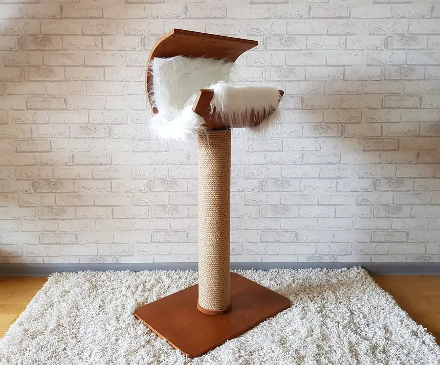 A beautiful easy to clean cat tree with a fuzzy, machine washable cushion for your cat from the Real Cat Tree Store on Etsy.